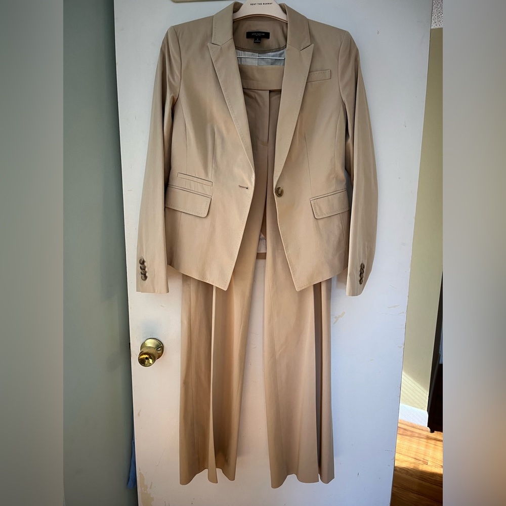 Ann Taylor suit separates of the same style and fabric sold together.